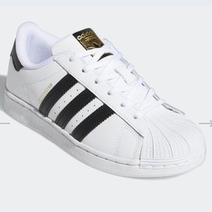 Adidas superstar shoes.